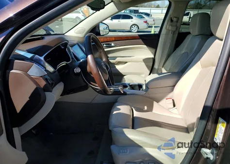 2015 Cadillac Srx Luxury Collection z USA, uszkodzony, nr VIN 3GYFNBE33FS528573